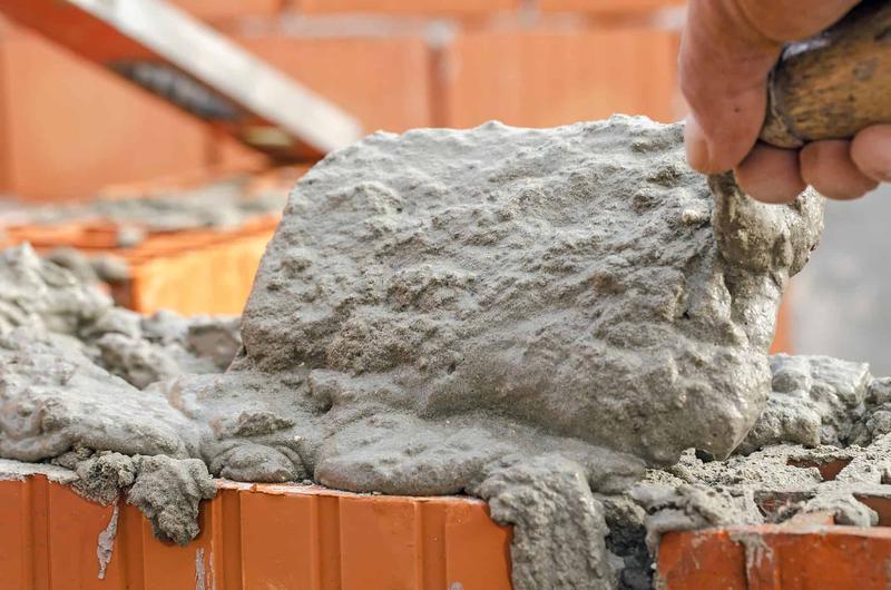 Ile łopat zaprawy murarskiej potrzebujesz? Sprawdź nasze obliczenia i praktyczne porady!